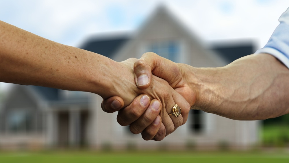 WA property law - shaking hands